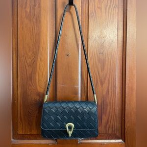 Black princess Polly purse with gold hardware